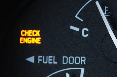 Check Engine Light on a Car Dashboard